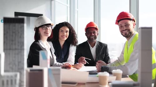Diverse Engineering Team Collaborating in Modern Office