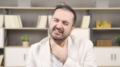 Man with goiter, thyroid problems.
