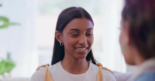 Two Friends Talking Indoors During Daytime