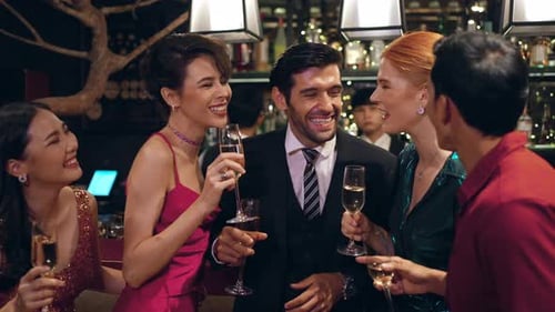 4K Group of people celebrating holiday event with drinking champagne together at luxury bar.