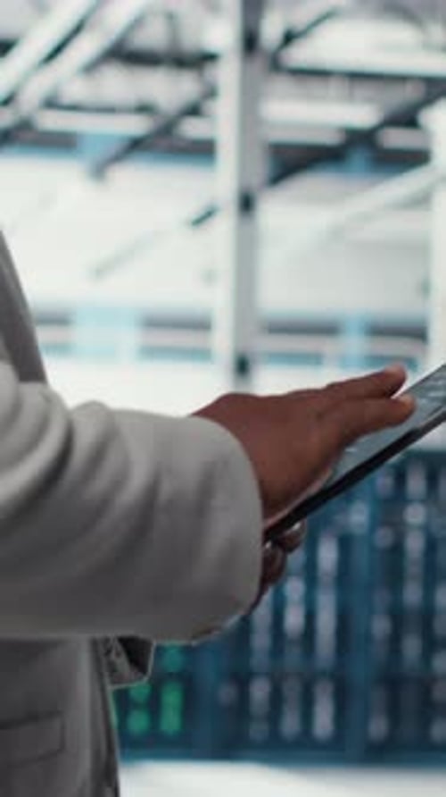 Vertical Video Programmer in Data Center Using Tablet to Manage Software Updates