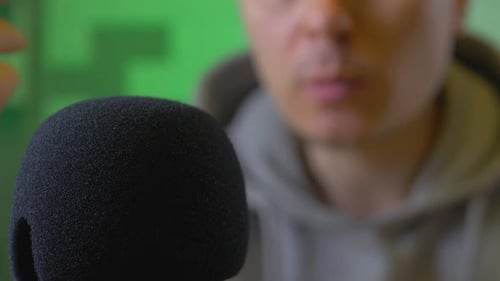 Sound Designer Record Voice on Microphone in Sound Studio