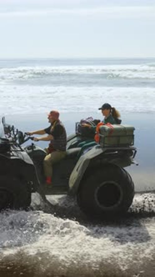 Exploring Coastal Adventures with AllTerrain Vehicle Thrilling Ride on Sandy Beaches with Scenic