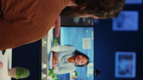 Man Talking to Woman on Video Call, Workplace