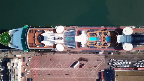 Large cruise ship docked at port - Aerial footage
