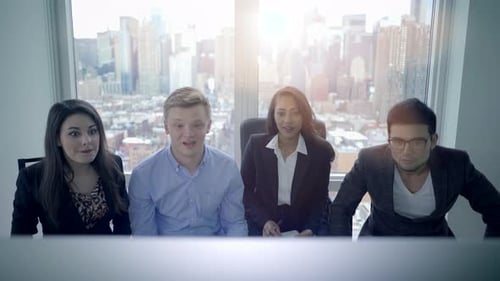 Excited Diverse Team Celebrating Corporate Success