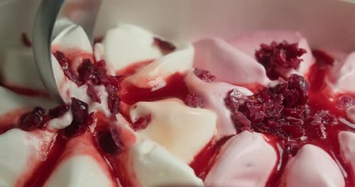 Delicious Ice Cream Being Scooped With Spoon
