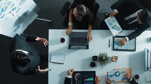 Top view of smart manager standing and present marketing plan. Directorate.