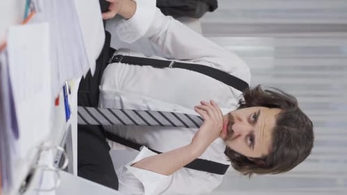 Frustrated Man With Paperwork Portrait Vertical Video
