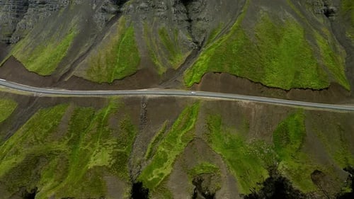 Aerial view of road on mountain side, Iceland.