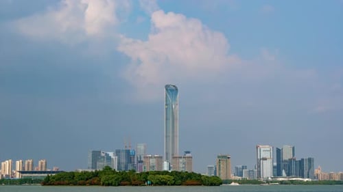 Time Lapse Cityscape at Daytime Blue Sky White Clouds Pass Over the IFS Building Downtown Business