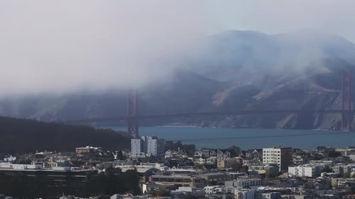 Aerial View of the Golden Gate Bridge Surrounded By Fog in San Francisco California USA