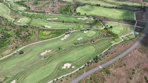 Aerial View of Green Golf Course and Countryside