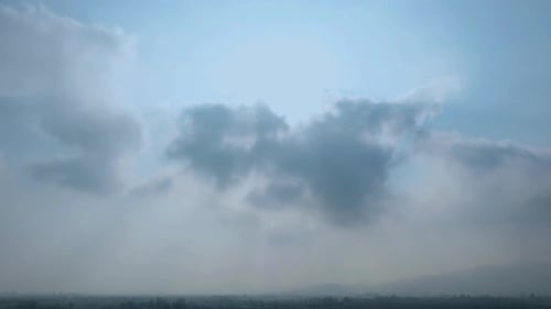 Wolken und Sonne im Zeitraffer