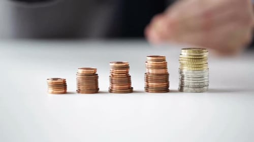 Business, People, Finances, Money Saving and Economy Concept - Close Up Of