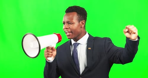 Protest, speaking and a black man with a megaphone on a green screen isolated on a studio