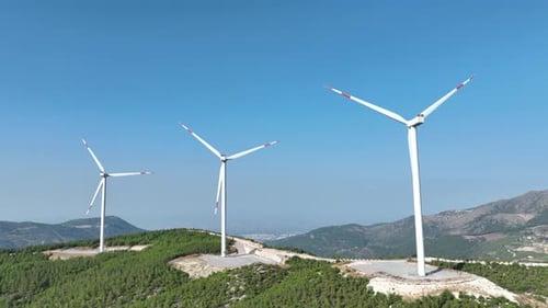 Aerial View Of Wind Energy Turbine Rotating In The Wind