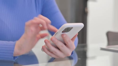 Close up of Woman Browsing Internet on Phone
