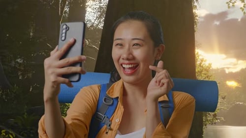 Close Up Of Asian Female Hiker Taking A Selfie While Exploring Forest Nature
