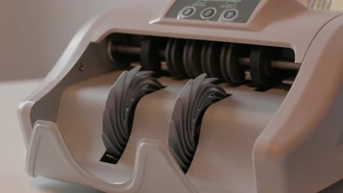 Money Counting Machine Counts US Currency