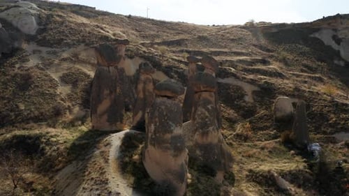 Scenic View Of Rock Formations Called Fairy Chimneys In Cavusin, Cappadocia, Anatolia, Turkey. Aeria