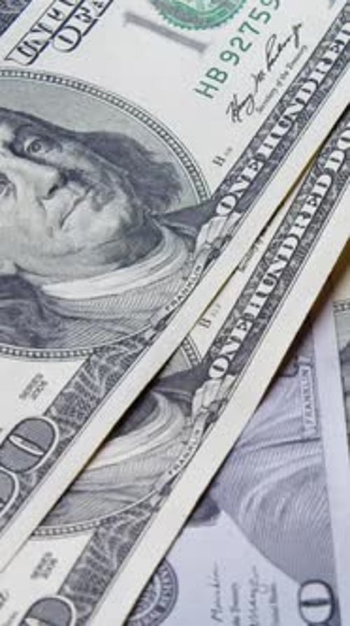 Close Up of Stacked One Hundred Dollar Bills