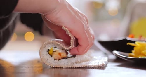 Preparing delicious sushi at home