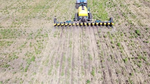 Blue Tractor O.A. Planting Canola On No Till Field