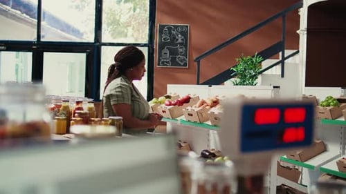 Loyal Customer Checking Bio Bulk Products in Zero Waste Shop