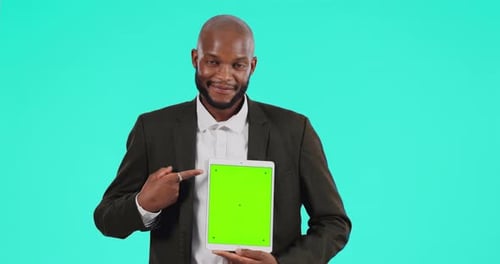 Man, tablet and pointing finger at mockup or green screen for website advertising list