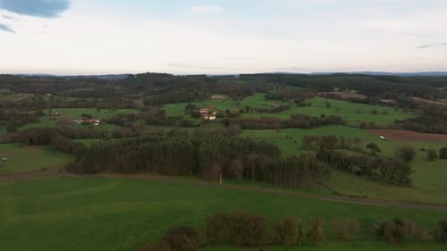 Rural Scene Of A Village In Evergreen Plains In Os Curras, Vilasantar. Aerial Drone Shot
