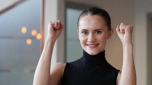 Excited Woman Celebrating Success