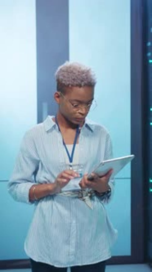 A Dedicated and Engaged Professional is Analyzing Complex Data Using a Tablet Device