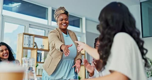Cheerful Businesswoman Receives Congratulations From Team