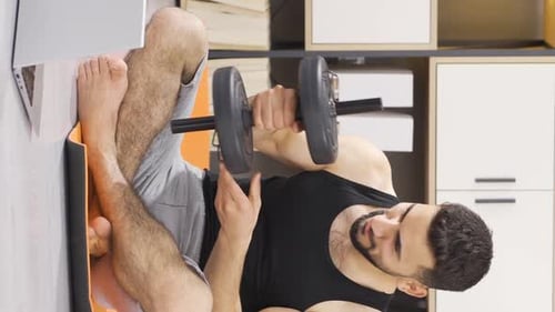 Vertical video of Fitness trainer gives online lessons.