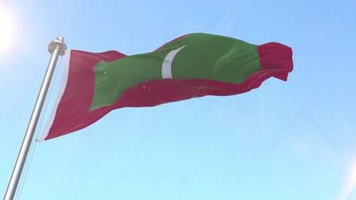 Maldives National Flag Waving in Sunny Blue Sky