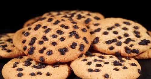 Cookies with Pieces of Dark Chocolate, Rotation. Homemade Piece Biscuit Top View Rotating Video