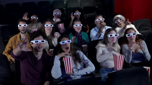 Audience Wearing 3d Glasses Watching Exciting Movie in Cinema