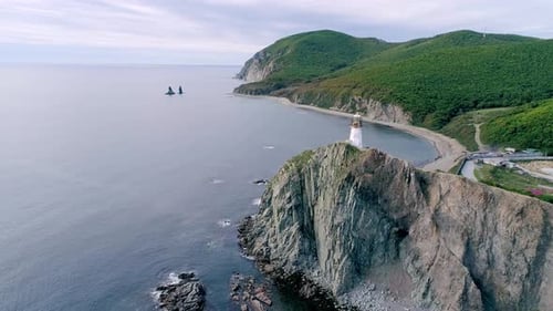 Aerial View of an Old Lighthouse on the Cliff on Pacific Coast Beautiful Panoramic Seascape