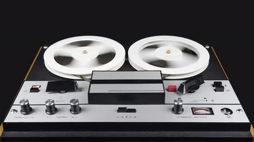 Vintage Reel to Reel Tape Recorder in Operation