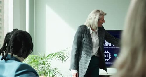 Business Woman Presents Machine Learning in Modern Office