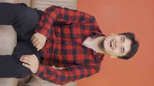 Vertical video of Man nodding in a positive way.