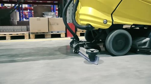 Industrial Floor Cleaning Machine in Warehouse A Detailed Shot of an Industrial Floor Cleaning