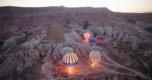Hot Air Balloons Preparing to Fly in Cappadocia at Dawn, Turkey