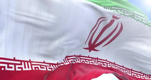 Realistic Waving Flag of Iran Against Blue Sky