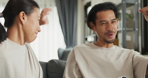 Couple Plays Video Games, Celebrates Victory