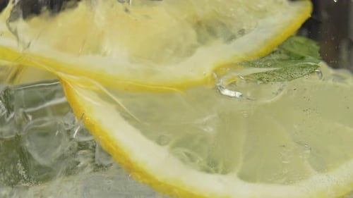 Sparkling Drink with Lemon, Mint and Ice Cubes