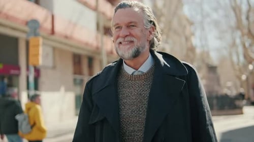 Happy Senior Man Walking in the City