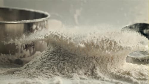 Super Slow Motion Egg Falls Into The Flour