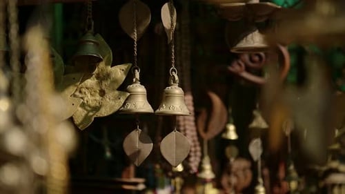 Prayer Bells For Sale in a Nepal Market, Gold Metal Prayer Bells in a Shop at a Temple at Bhaktapur